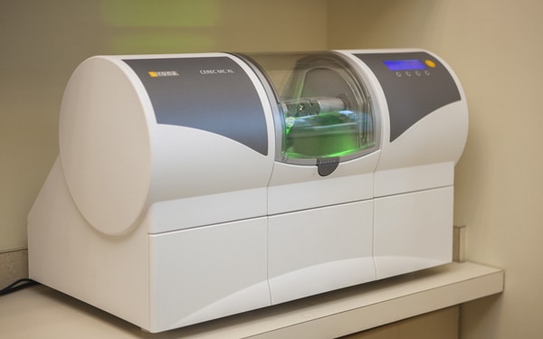 The CEREC MC XL mill that shapes same-day crowns at Regency Square Dental.